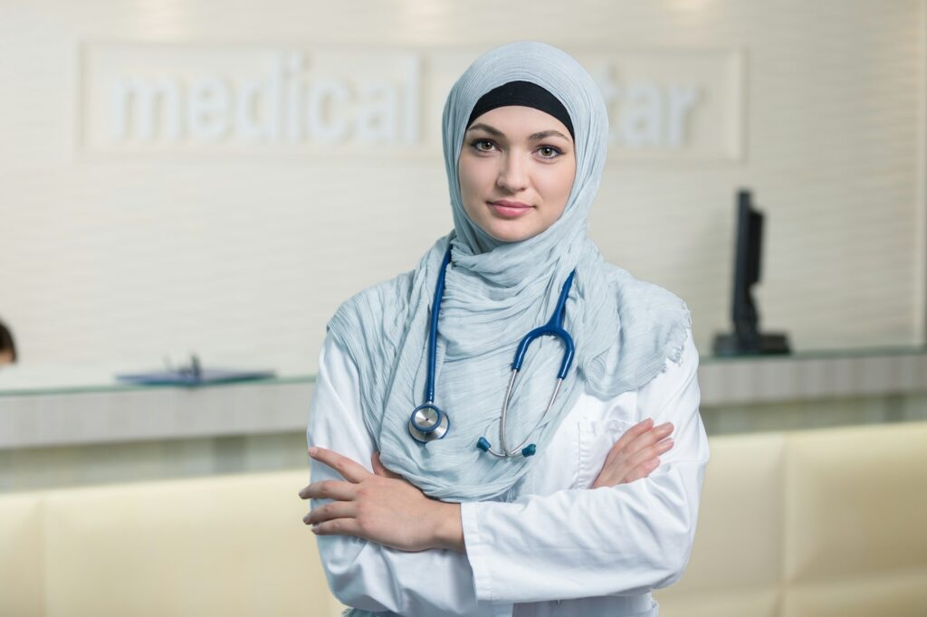 Closeup portrait of friendly, smiling confident muslim female doctor.